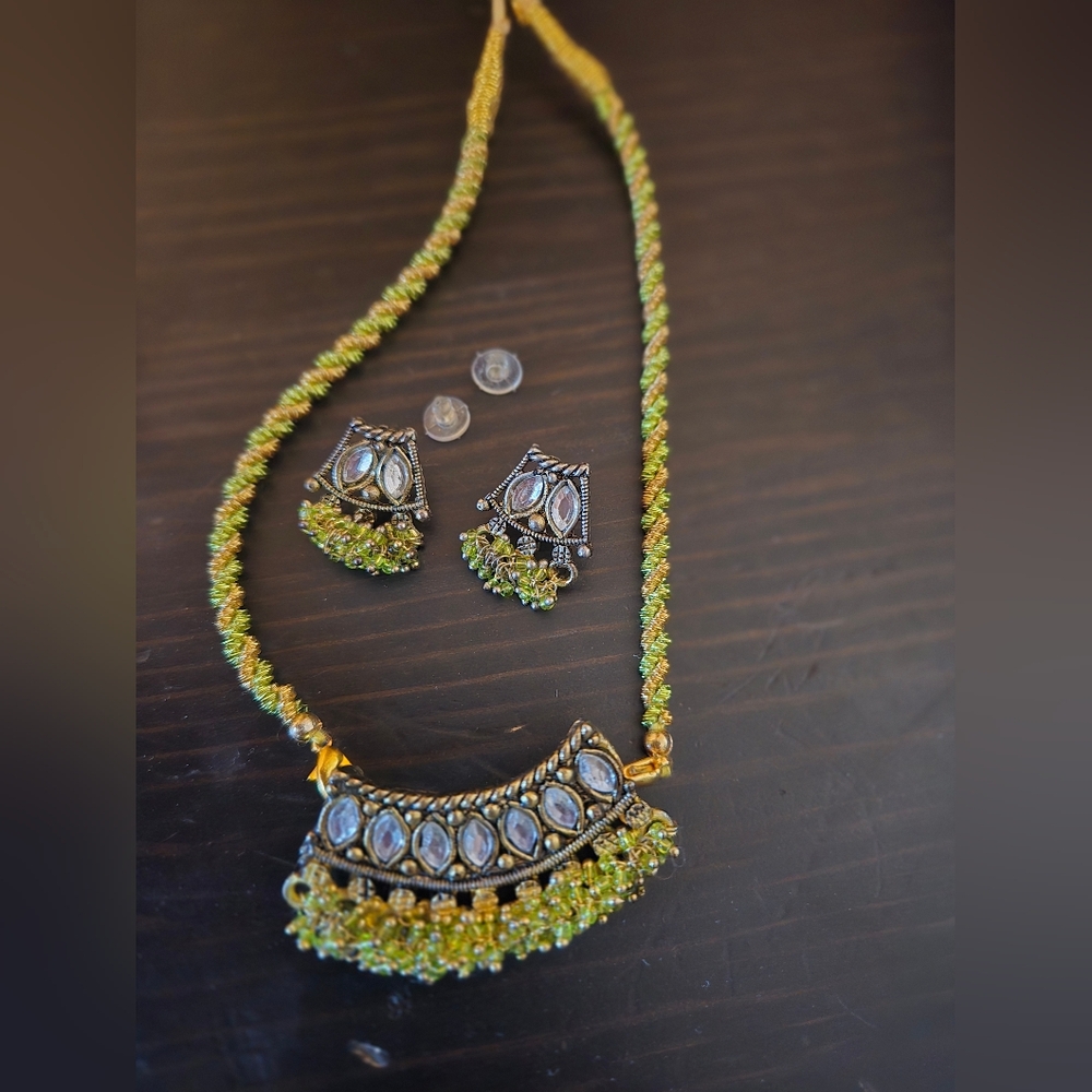 Indian-style jewelry set featuring a necklace and matching earrings
